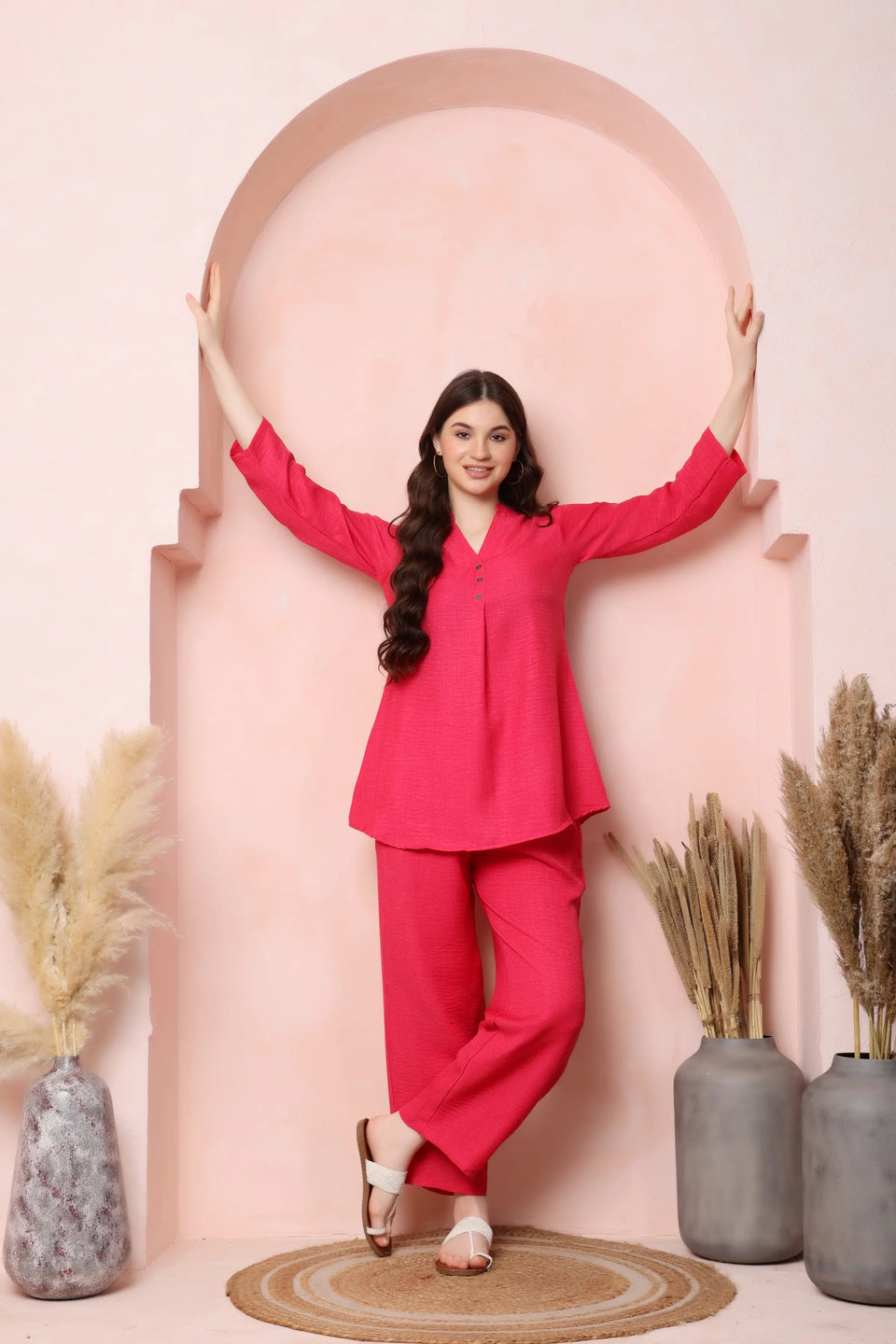 Full-length standing view of RABRIC coral pink twill co-ord set with matching trousers