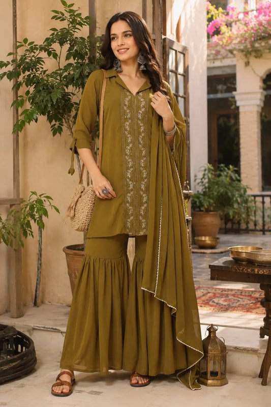 Woman wearing olive green satin ethnic kurta sharara set with dupatta in elegant lifestyle fashion look by Rabric
