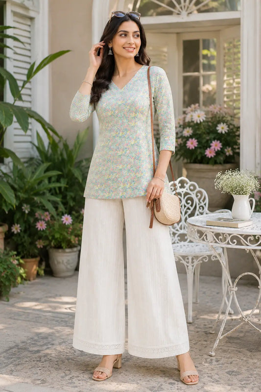 Rabric women pastel floral cotton short top styled with white palazzo pants in casual lifestyle fashion look