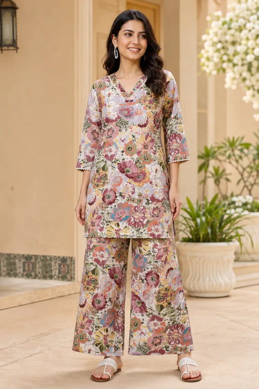 Rabric dusty pink mauve floral print cotton co-ord set for women featuring a V-neck short kurta style top with 3/4 sleeves and matching wide leg palazzo pants for summer daily wear.