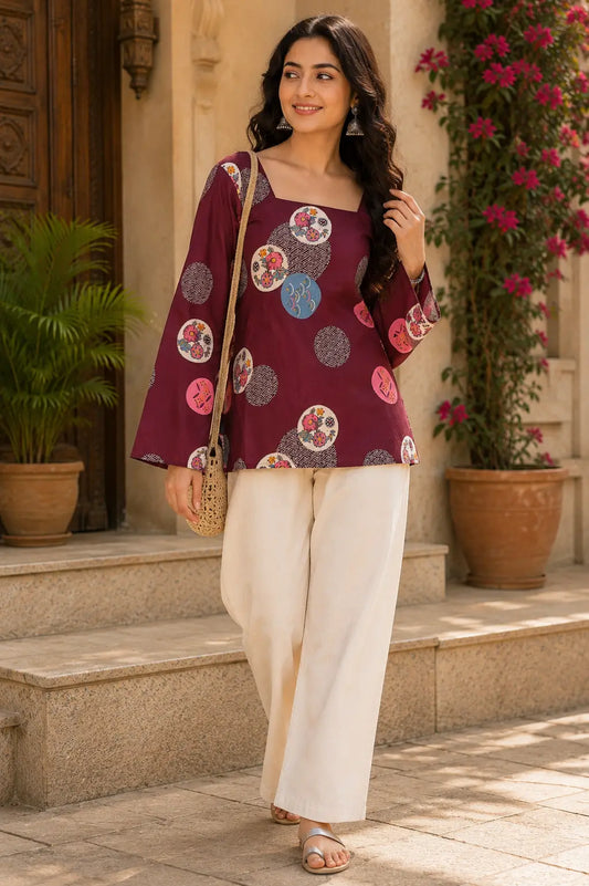 Rabric maroon cotton short top for women with square neck, circular floral print and full bell sleeves front view