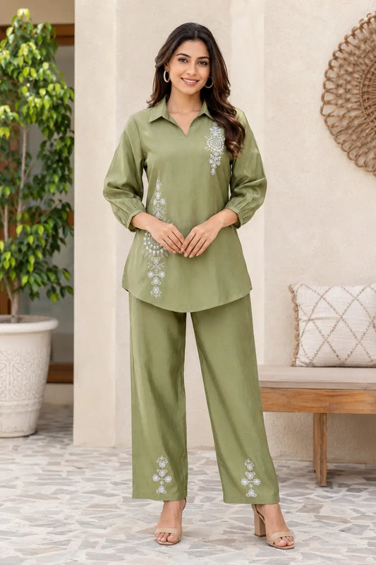 Rabric olive green cotton co-ord set front view with collar neck top, wide leg pants and white floral mandala embroidery for women