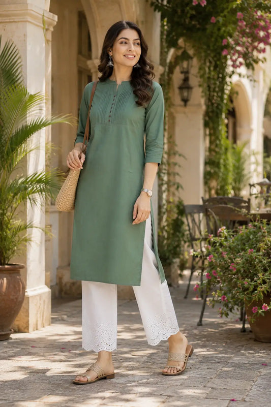 Woman wearing olive green popline cotton kurti with white pants in stylish casual lifestyle ethnic fashion look