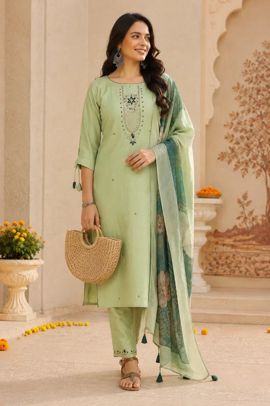 Woman wearing Rabric pista green cotton ethnic kurta pant set with dupatta in elegant lifestyle fashion look