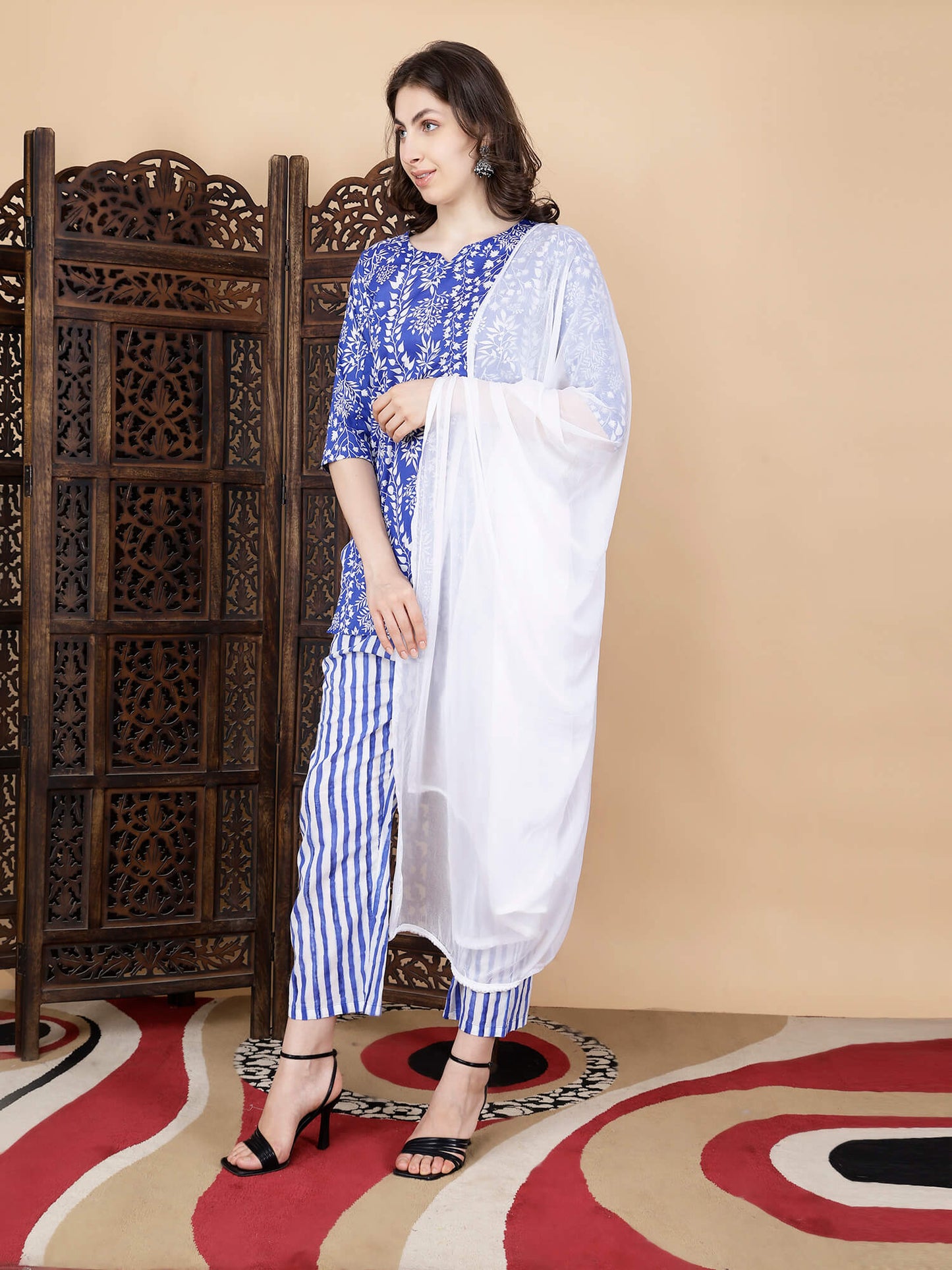 Side view of Rabric premium blue kurti and striped pant set