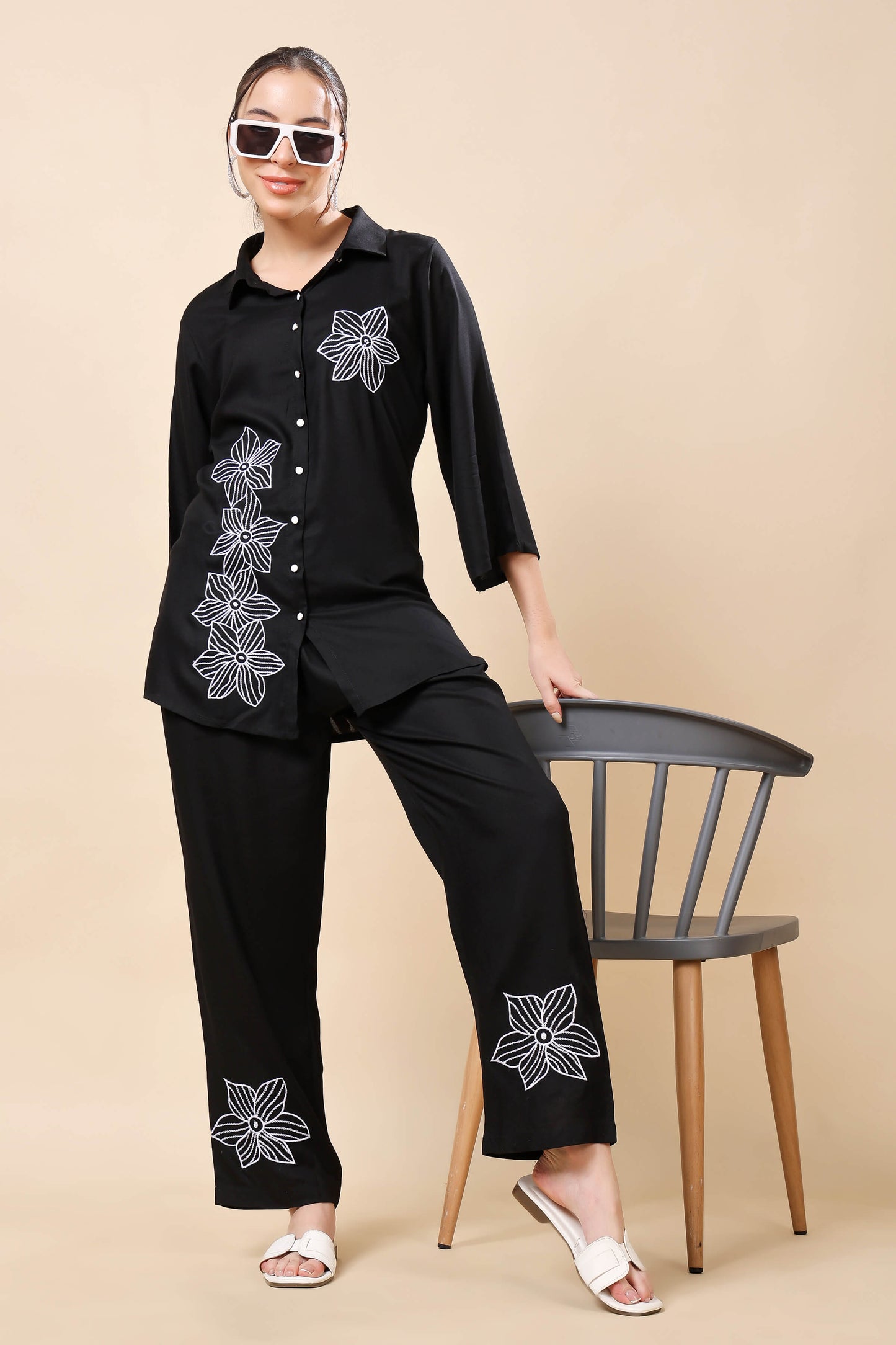 Model wearing Rabric black floral embroidered co-ord set for women
