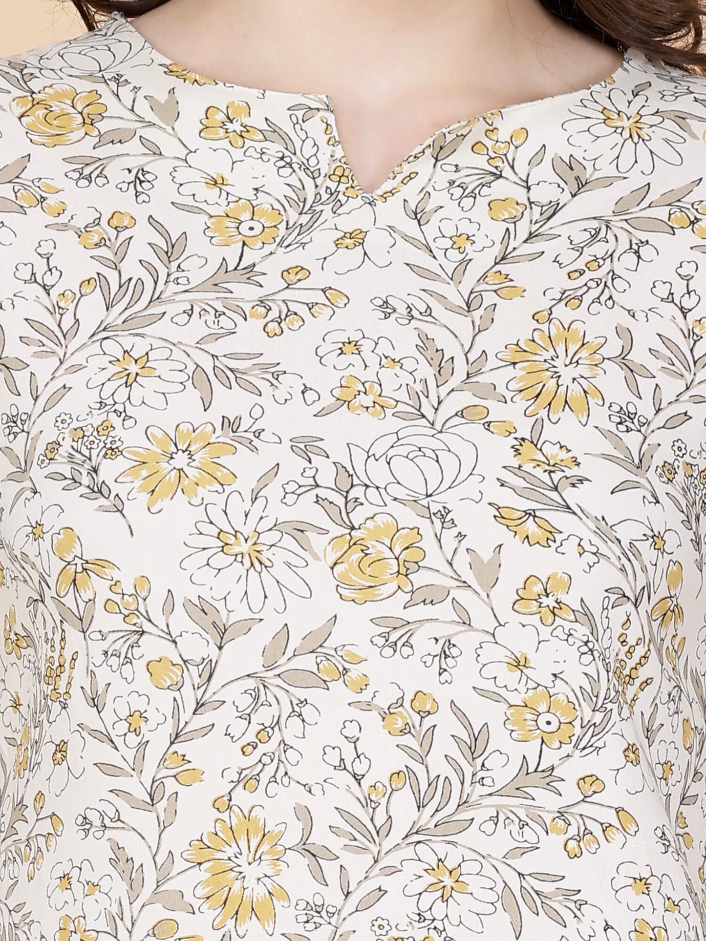 Close-up of floral rayon fabric and stitching details