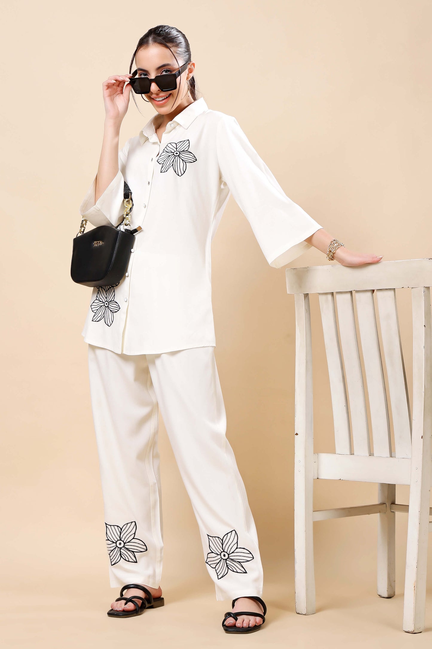 Model wearing Rabric white floral embroidered co-ord set