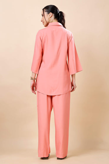 Back view of Rabric peach co-ord set with relaxed trousers