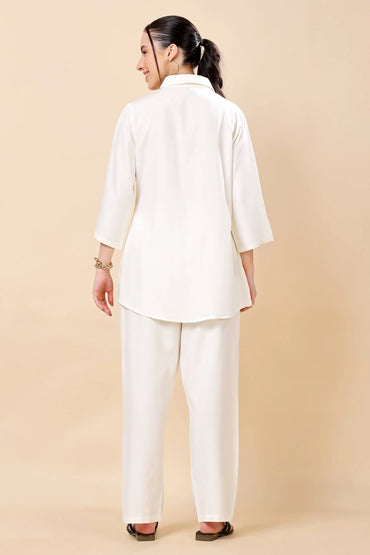 Back view of Rabric white rayon co-ord set with relaxed trousers