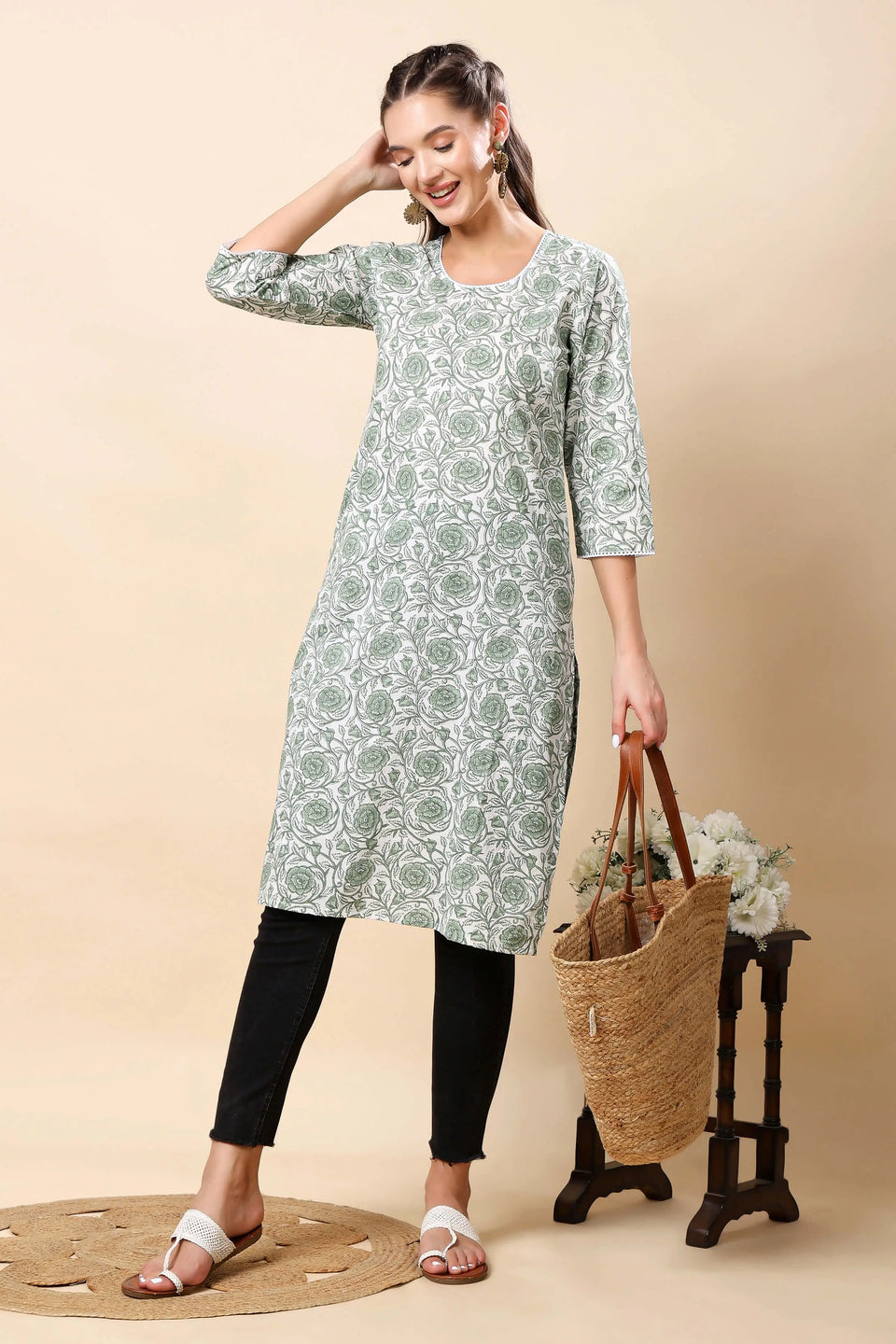 round neck with lace detailing on Rabric floral kurti