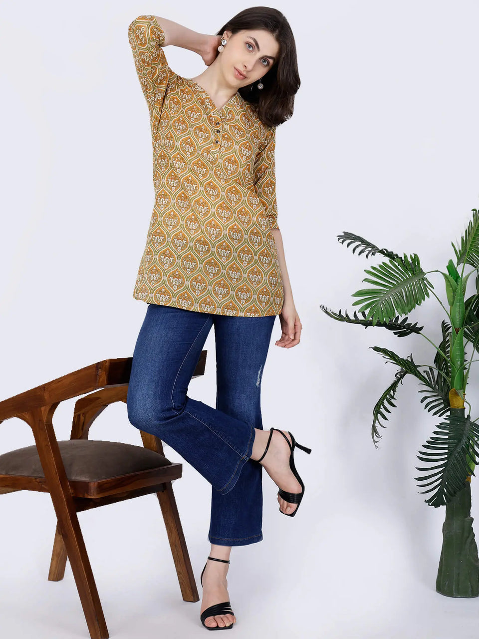 Women’s short kurti styling idea in mustard yellow by Rabric
