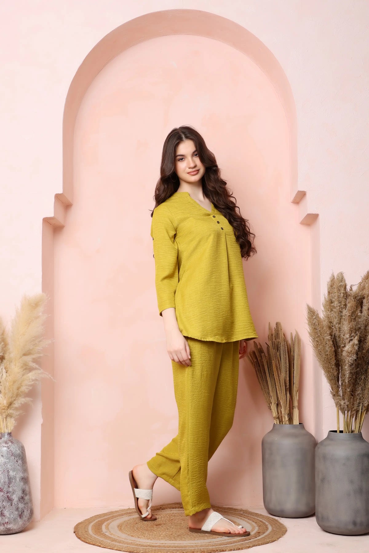Left-side view of RABRIC mustard yellow twill co-ord set showing the gently flared top and relaxed fit.