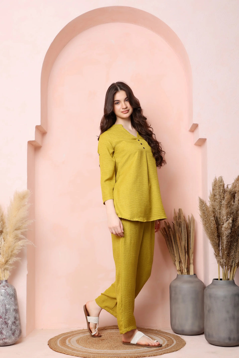 Left-side view of RABRIC mustard yellow twill co-ord set showing the gently flared top and relaxed fit.