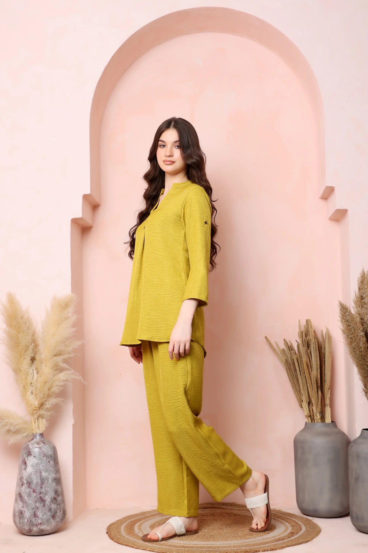 Right-side view of RABRIC mustard yellow twill co-ord set showing three-quarter sleeves and wide-leg trousers.