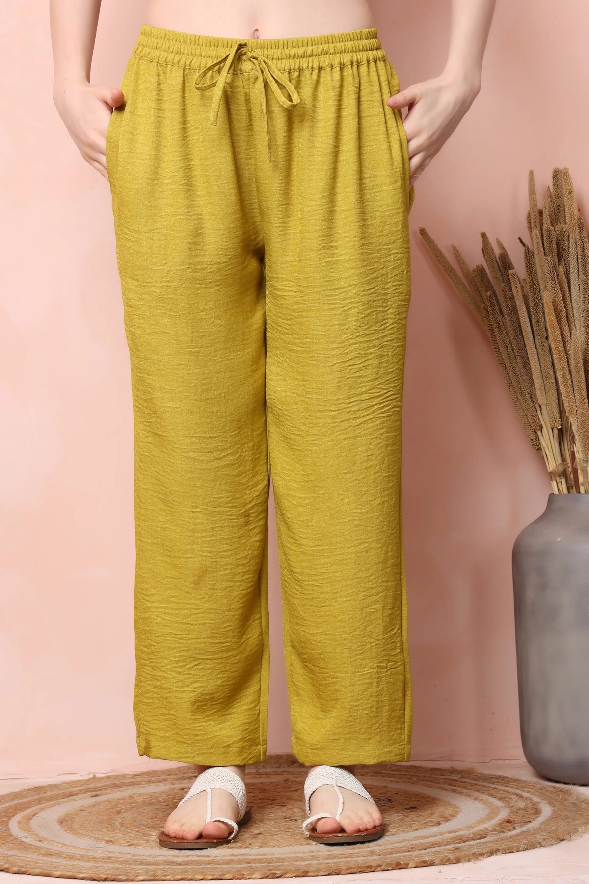 RABRIC mustard yellow twill co-ord trousers showing the elasticated drawstring waist and textured fabric.