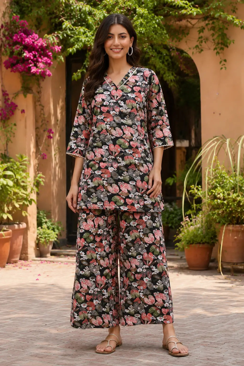 Rabric black cotton floral print co-ord set for women with V neck short kurta and wide leg pants front view