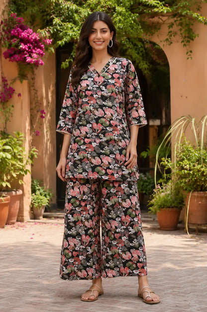 Rabric black cotton floral print co-ord set for women with V neck short kurta and wide leg pants front view