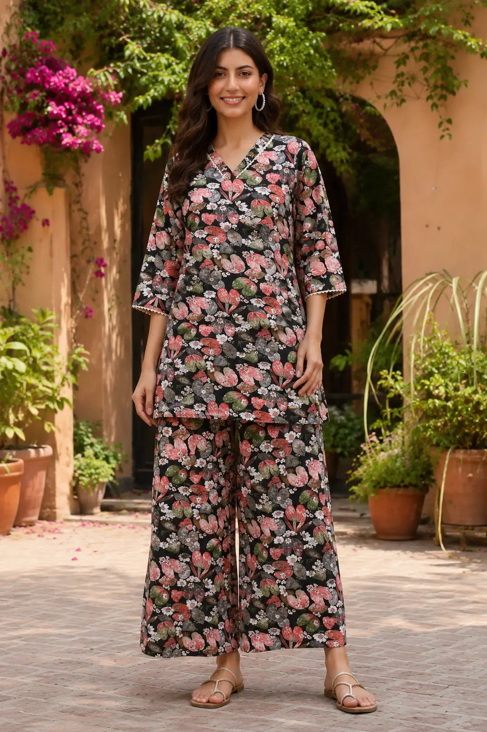 Rabric black cotton floral print co-ord set for women with V neck short kurta and wide leg pants front view