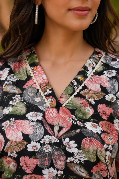 Close up of Rabric black cotton floral print co-ord set V neck design with lace border and bead detail