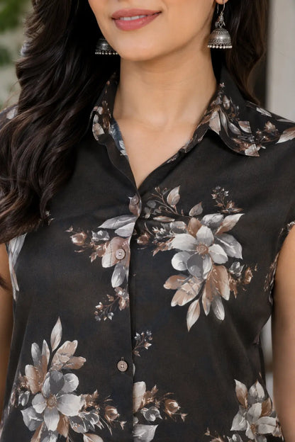 Close-up of black floral sleeveless co-ord set with collared neck