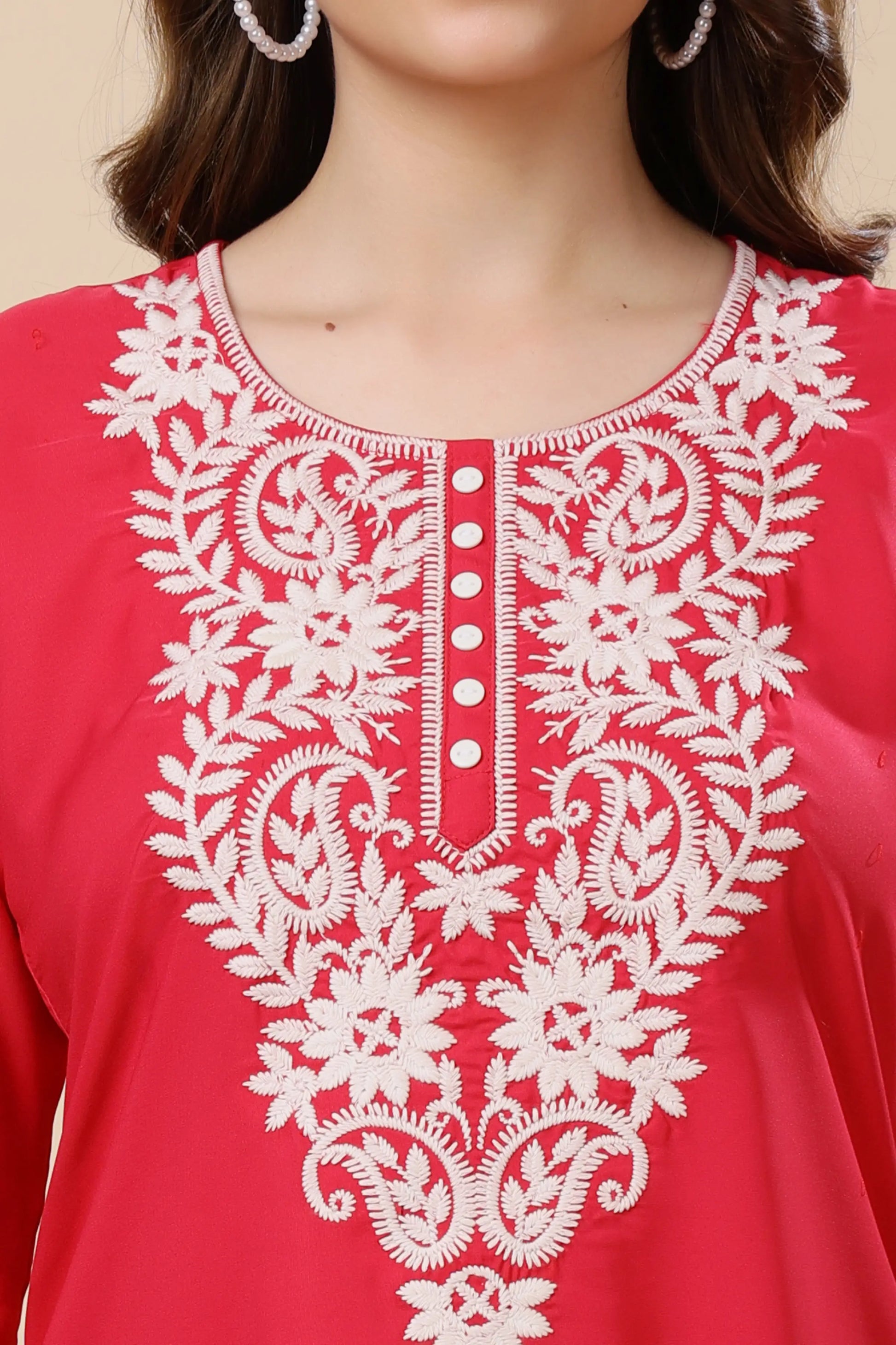 Elegant embroidered sleeves on stylish crepe short kurti in Neon Red