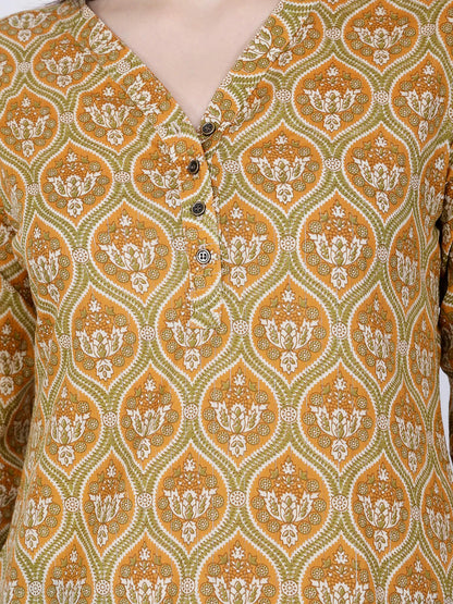 Close-up of ethnic floral print on mustard cotton kurti