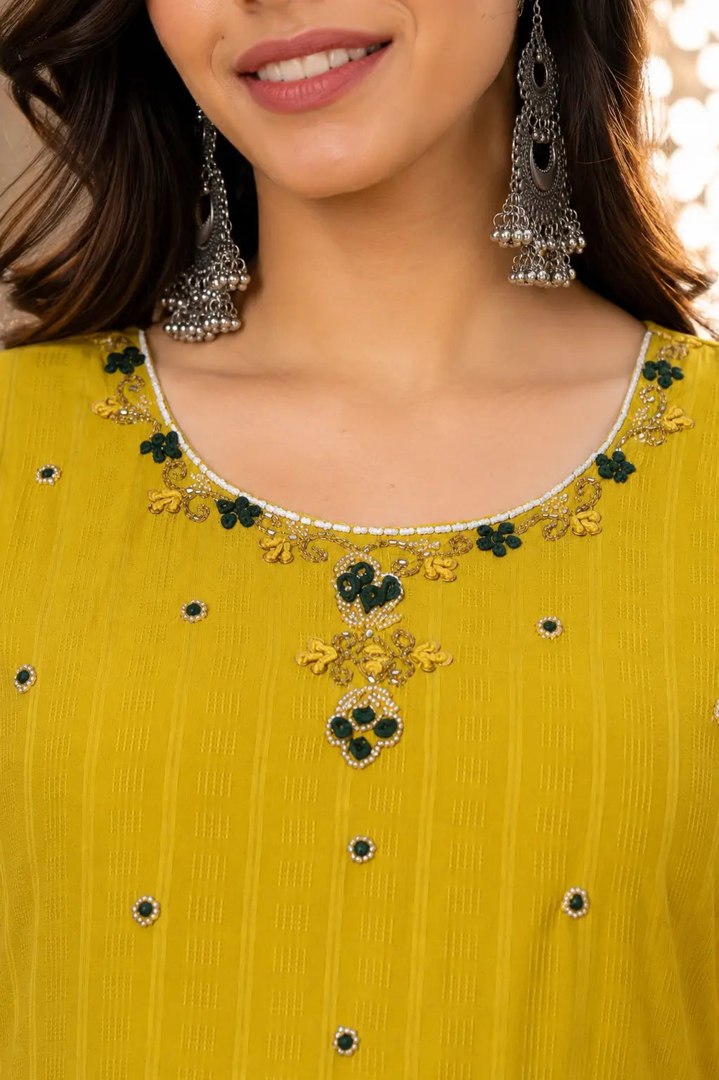 Closeup neck embroidery design on mustard yellow cotton sleeveless kurta for women by Rabric