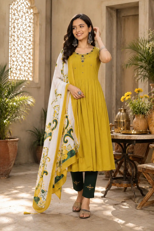 Rabric mustard yellow cotton kurta pant set with floral printed dupatta front view for women ethnic wear