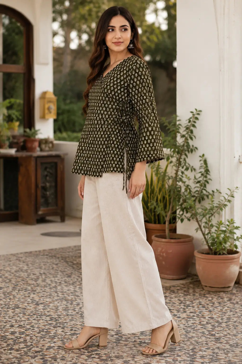 Rabric olive green Cotton floral short top side view with side dori design, hip length style and cream wide leg bottom.
