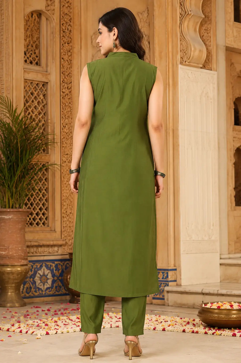 Back view of olive green satin sleeveless long kurta pant set with dupatta for women by Rabric ethnic wear collection