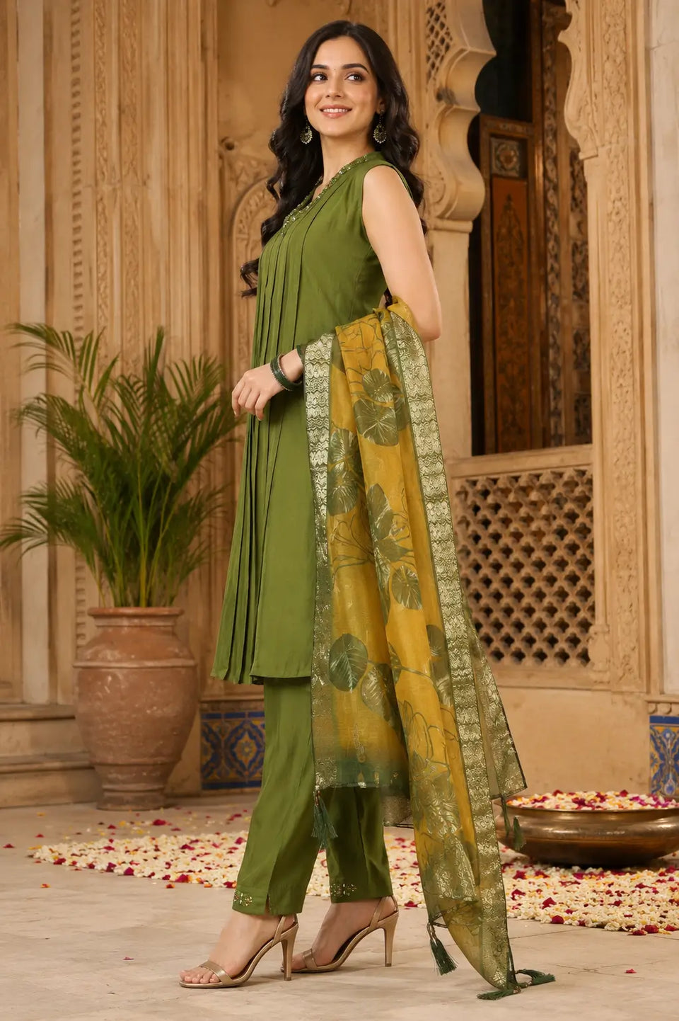 Side angle view of olive green satin sleeveless kurta pant set with dupatta for women by Rabric