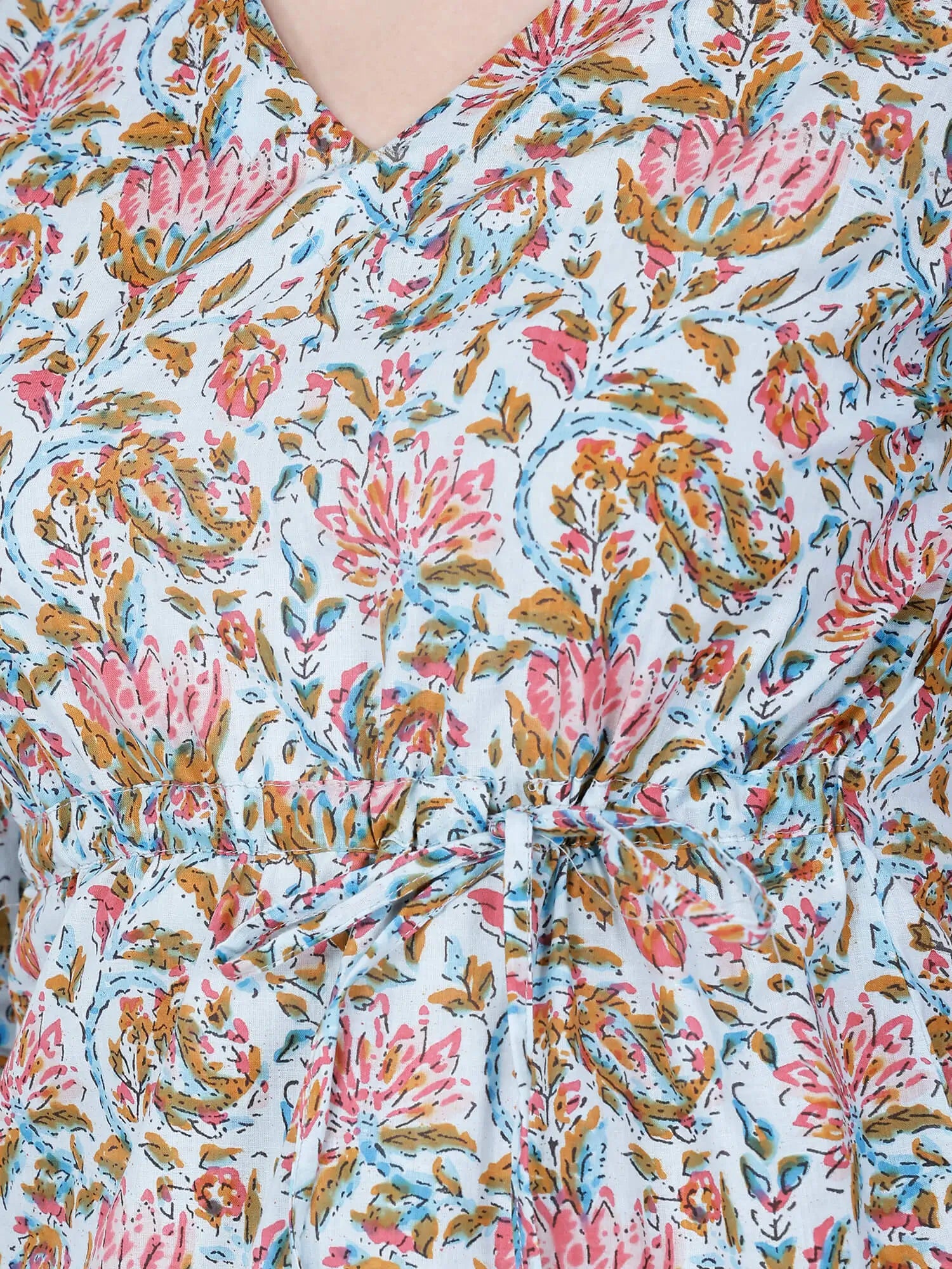 Close-Up View of Floral Print on Blue Cotton Short Kurti