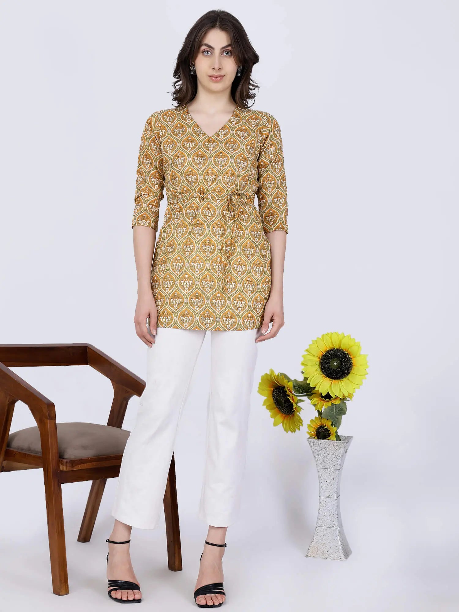 Mustard Yellow Short Kurti Styled with White Pants by Rabric