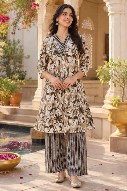 Rabric beige brown cotton floral kurta palazzo set for women front view with 3-4 sleeves and printed ethnic co ord set