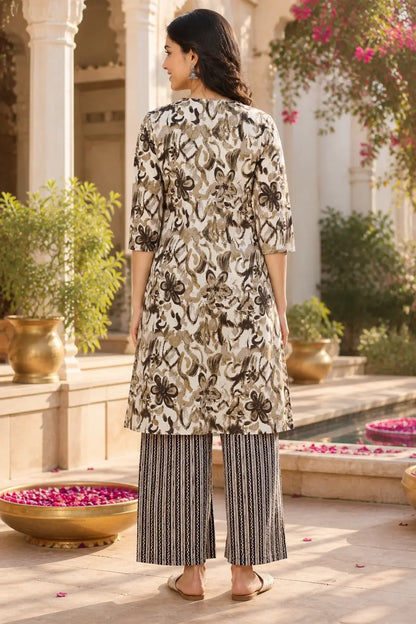 Back view of Rabric beige brown cotton floral kurta and striped palazzo pant set for women with mid length kurta