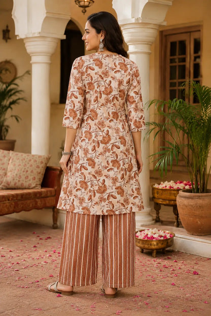 Back side view of Rabric women beige floral cotton kurta pant set with comfortable striped pants