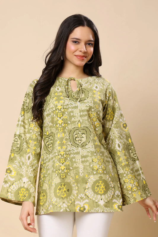 Bell sleeve detail of women green printed cotton short top