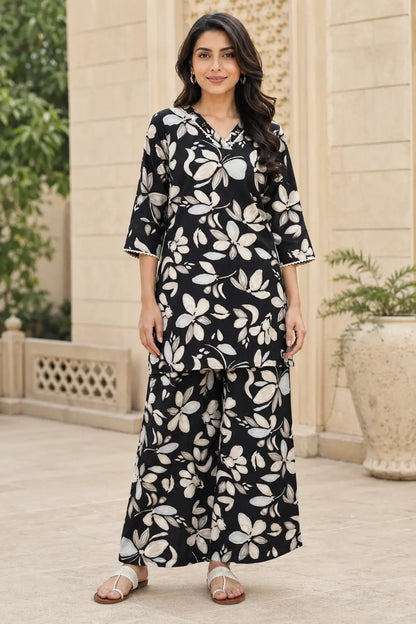 Rabric women's black and beige floral print cotton co-ord set featuring a V-neck short shirt with 3/4 sleeves and matching wide leg palazzo pants front view