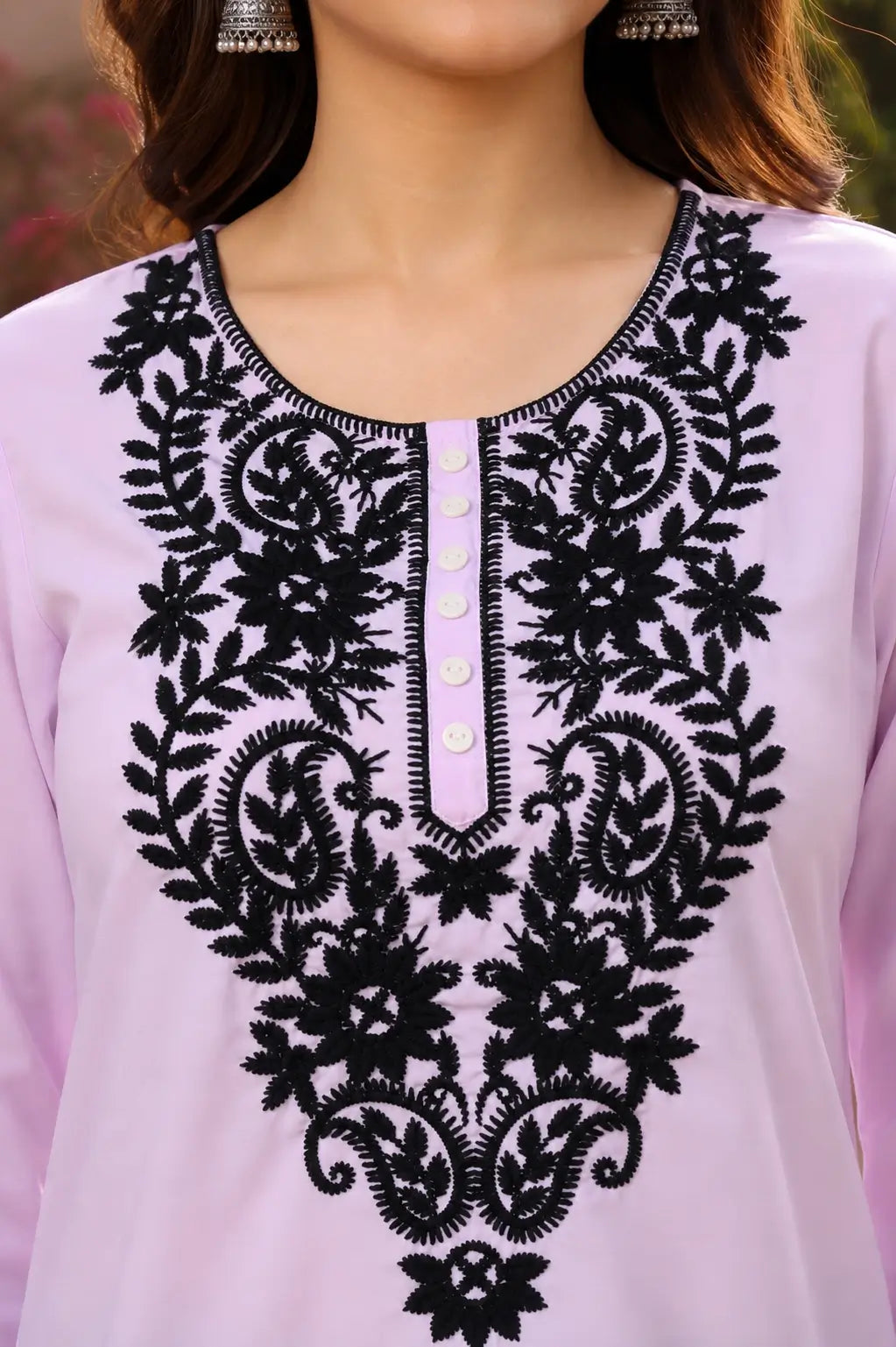 Closeup neck design of lavender cotton embroidered kurti for women by Rabric with black thread embroidery