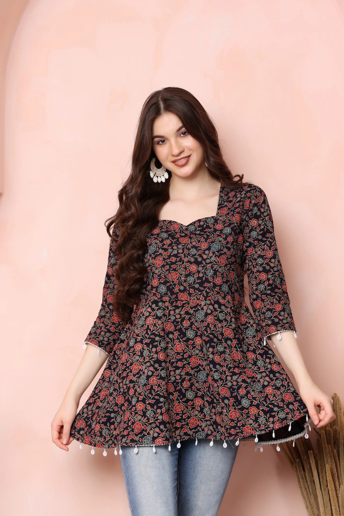 Side view of RABRIC black floral pure cotton flared short kurti for women