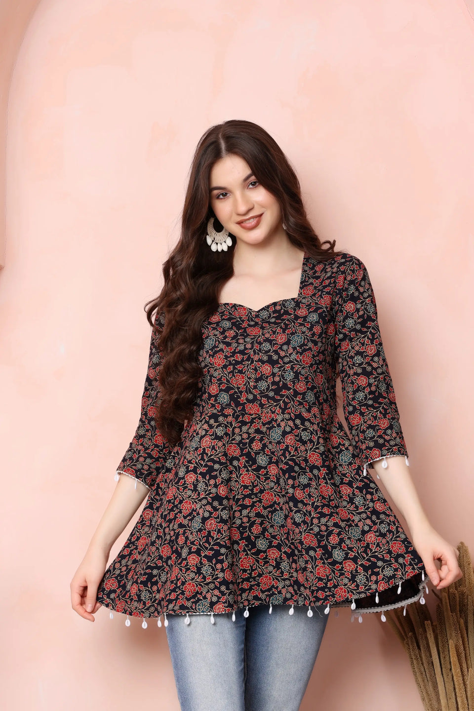 Side view of RABRIC black floral pure cotton flared short kurti for women