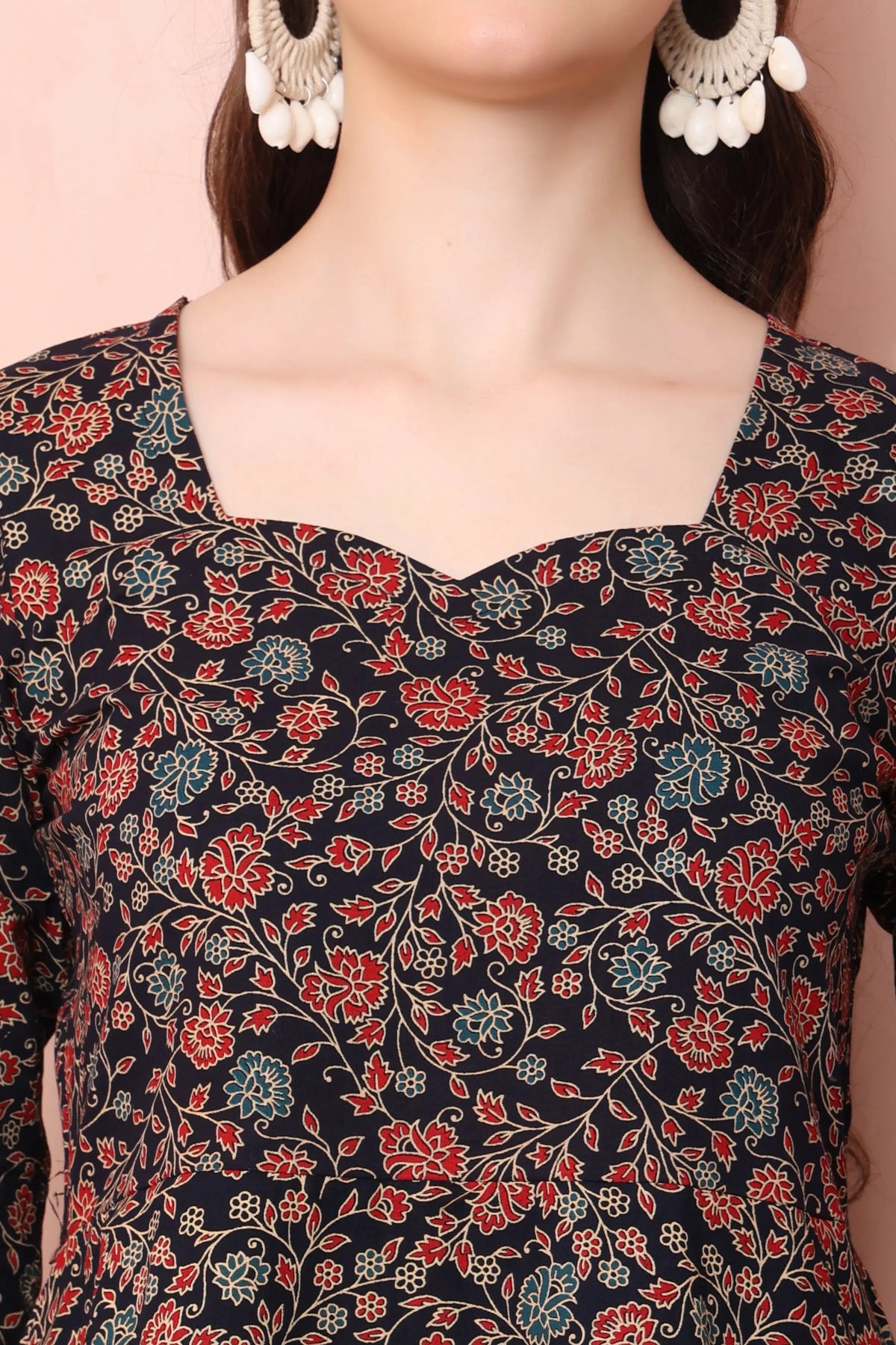 Close-up of RABRIC black floral pure cotton short kurti with sweetheart-style neckline