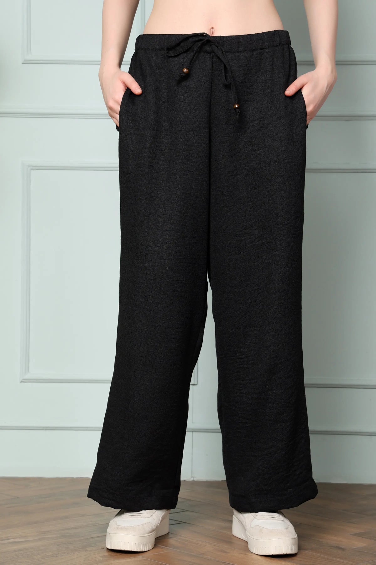 RABRIC black linen wide leg trousers for women front view with drawstring waist and two pockets