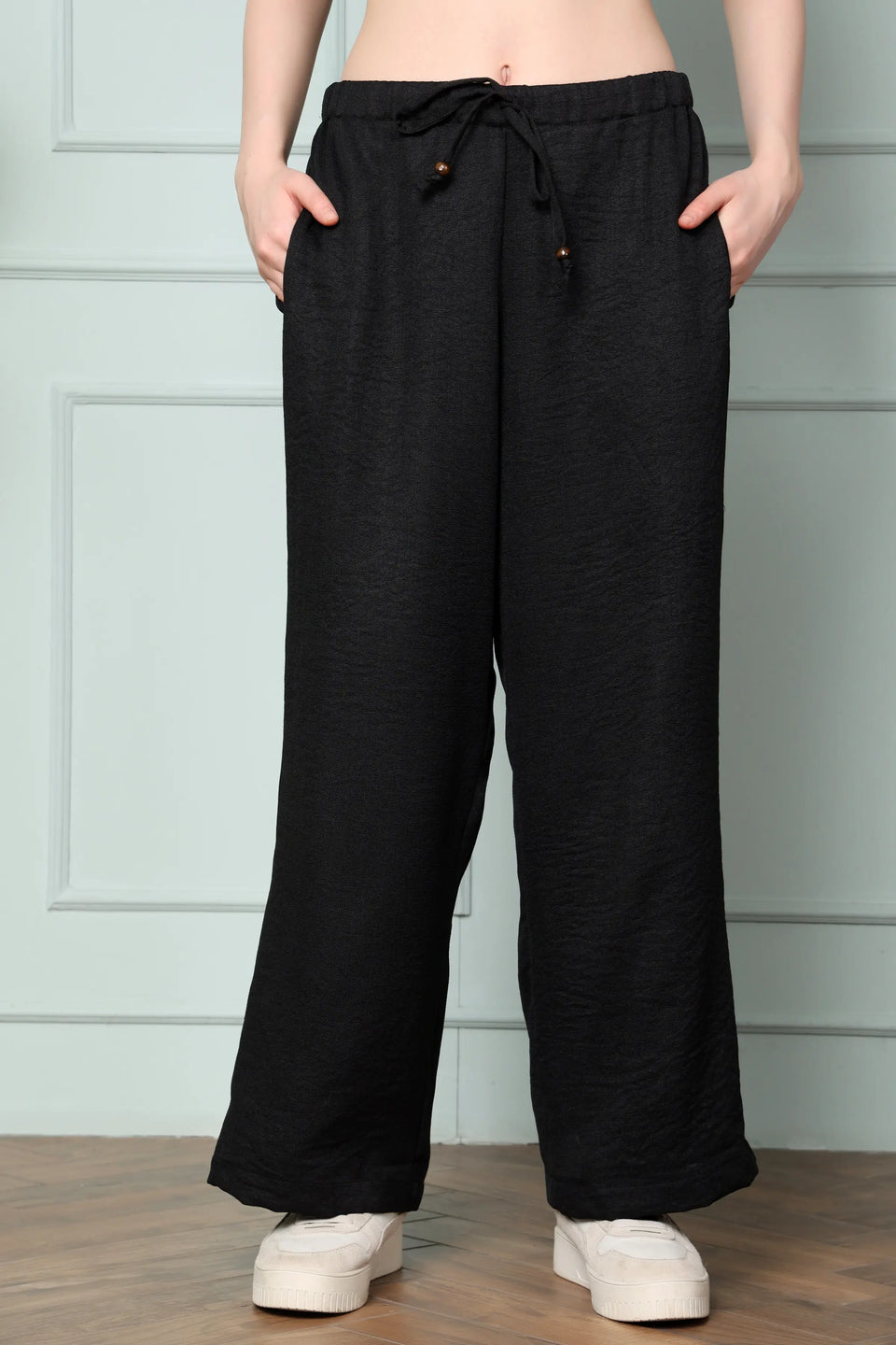 RABRIC black linen wide leg trousers for women front view with drawstring waist and two pockets