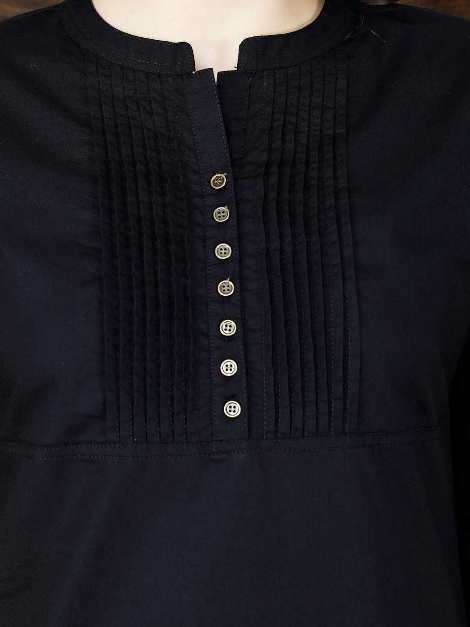 Close-up of Brass Buttons and Pintuck Design on Rabric Kurti
