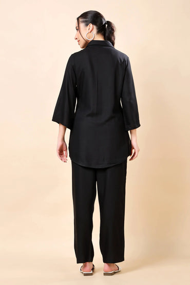 Back view of Rabric black co-ord set with relaxed trousers