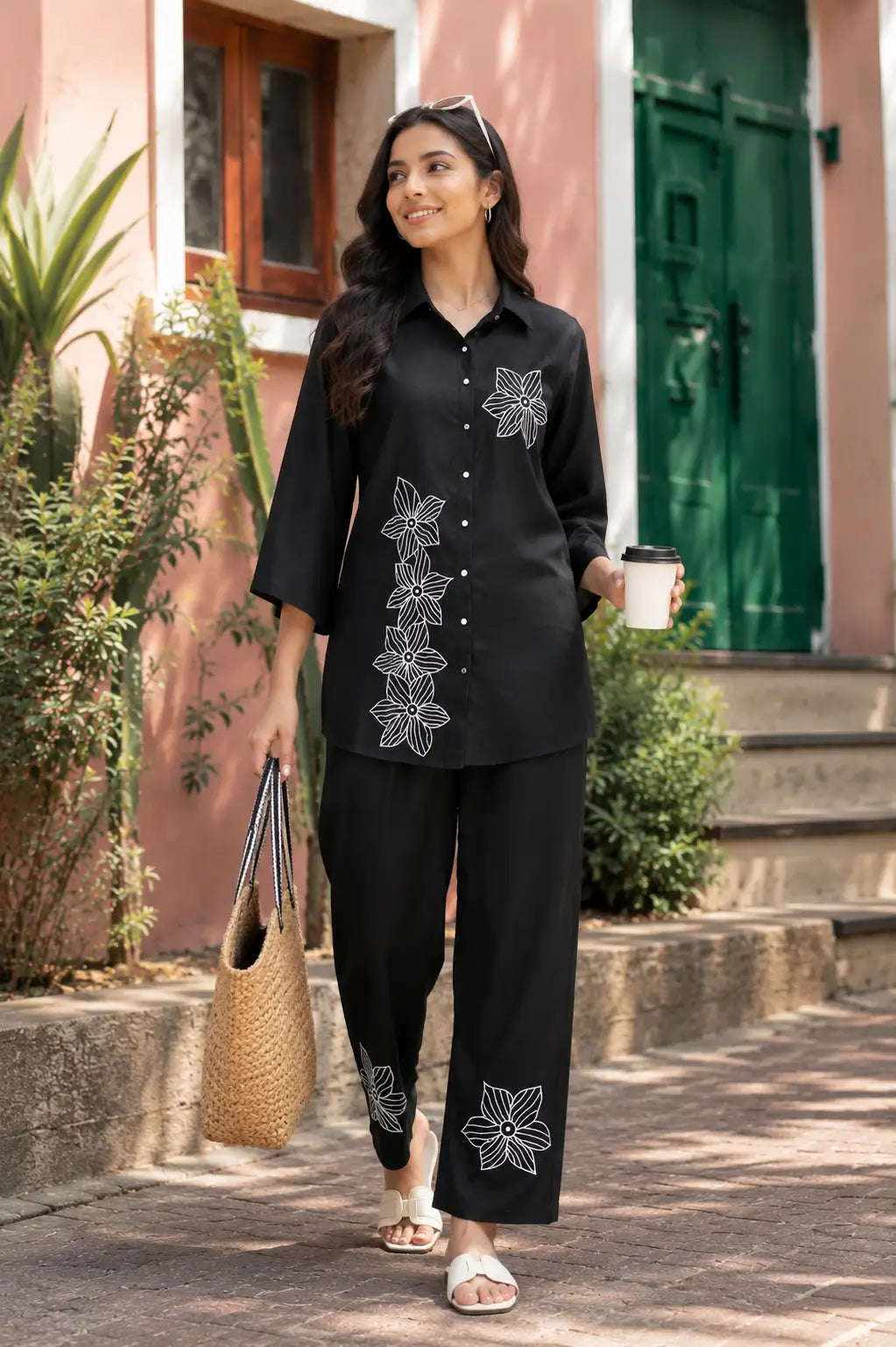 Rabric black rayon co-ord set for women with white floral embroidery, short shirt style top, 3/4 sleeves and matching straight pants front view