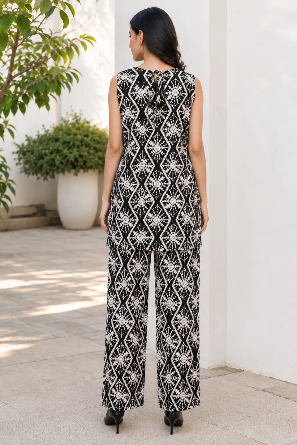 Rabric black rayon women’s co-ord set with cream geometric floral print, sleeveless tunic top and matching pants back view