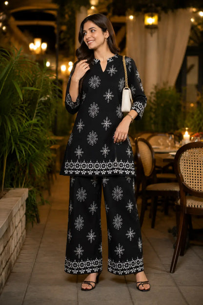 Rabric black Vertican Silk stylish co-ord set for women styled for date night look with elegant floral print and matching accessories